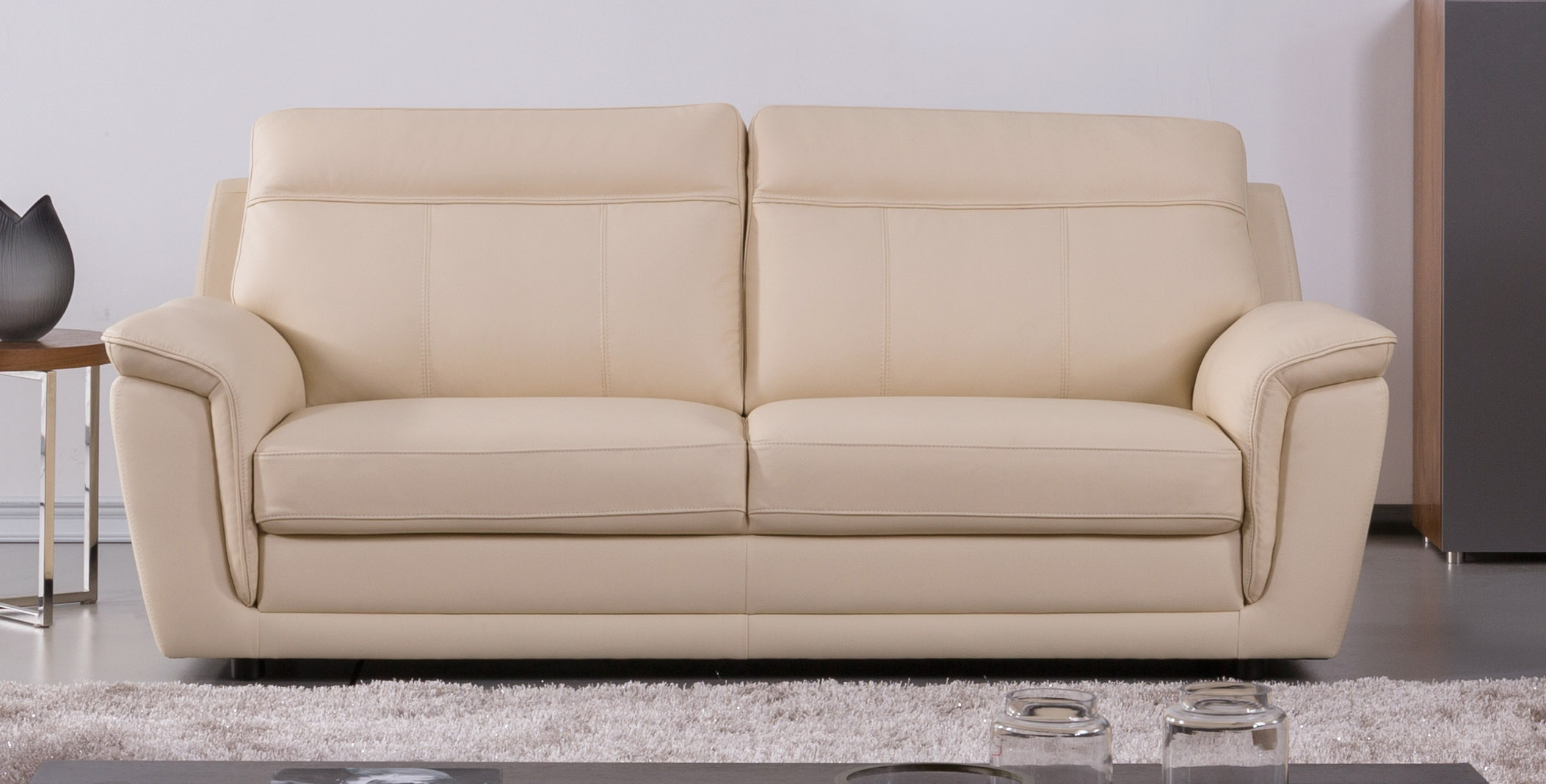 beige leather sofa and loveseat set